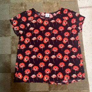 Cabi Poppy shirt with back slit.